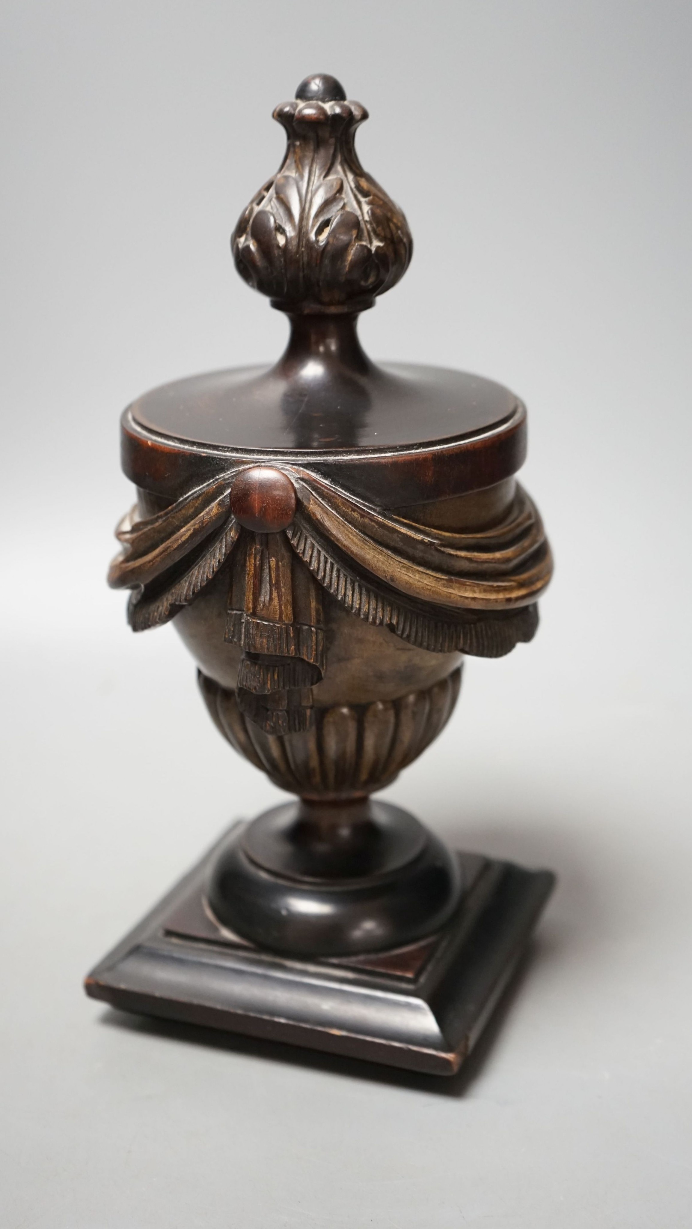 E. H. Pinto collection - a 19th century painted treen neo classical urn, 28cms high.